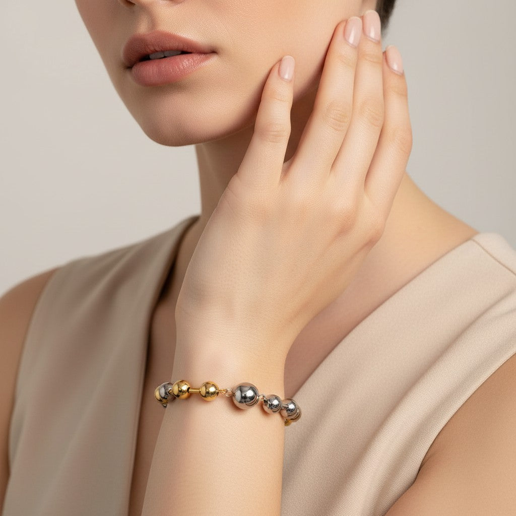 Seraphina Treasures Elara bracelet with gold and silver tone beads, lobster clasp closure.
