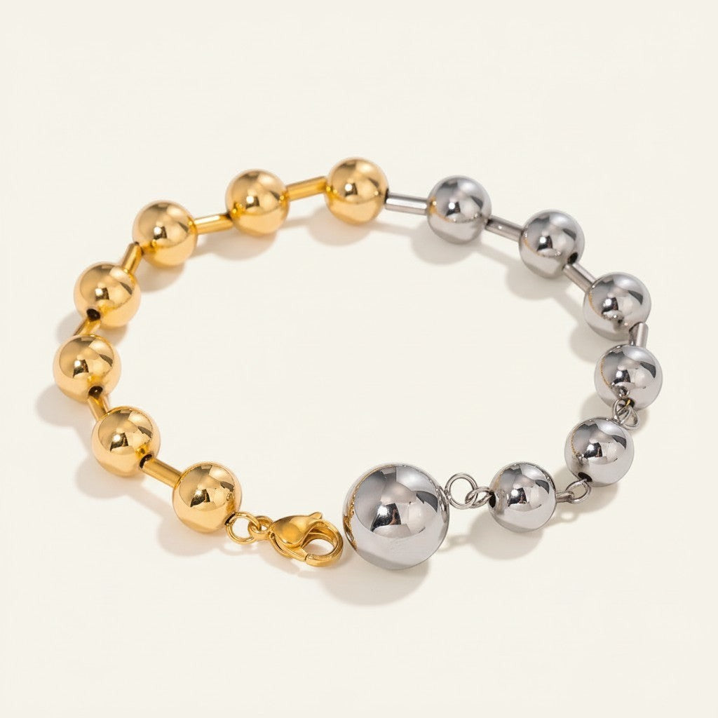 Seraphina Treasures Elara dual-tone beaded bracelet in gold and silver.
