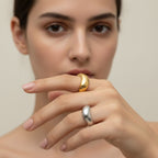Seraphina Treasures Electra Ring in gold and silver, featuring a unique irregular wave design. Modern statement ring.