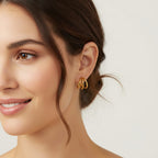 Seraphina Treasures Elidyr gold triple hoop earrings with a shiny finish.