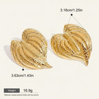 Seraphina Treasures Elowen gold leaf-shaped statement earrings, detailed texture, lightweight and hypoallergenic.
