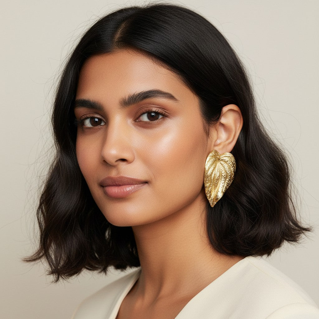 Seraphina Treasures Elowen gold leaf statement earrings with intricate detailing. Lightweight and elegant.