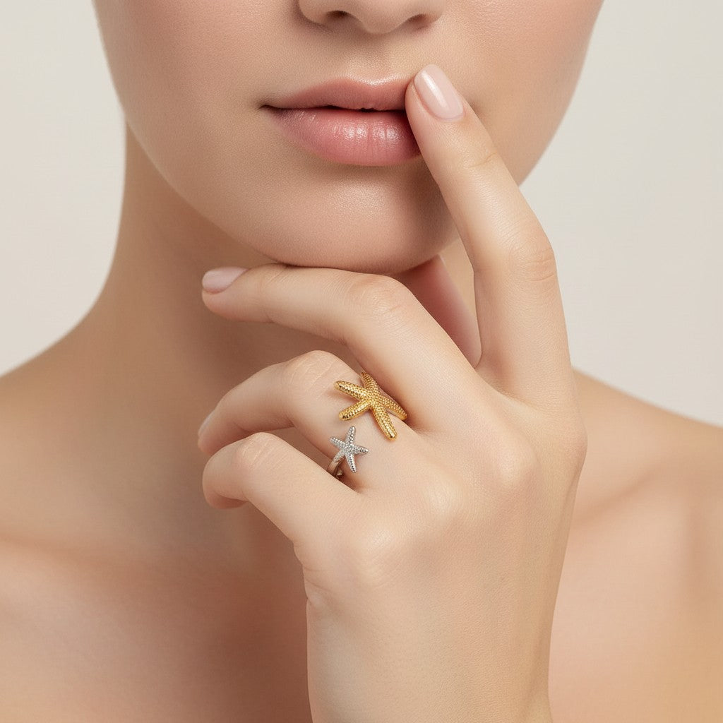 Seraphina Treasures Elysia open ring with two starfish, one gold and one silver, adjustable.
