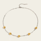 Seraphina Treasures Eosphor mixed metal necklace with gold beads on a silver chain. Adjustable clasp.