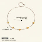 Seraphina Treasures Eosphor necklace with mixed metal chain and gold beads. Waterproof and hypoallergenic.
