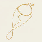 Seraphina Treasures Faustina gold-tone layered body chain bracelet with delicate bead accents.