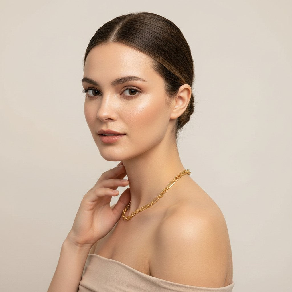 Seraphina Treasures Fenella gold necklace with hollow links worn by a model.