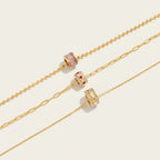 Seraphina Treasures Florentia necklace with gold chains and crystal bead pendants in pink, red hearts, and clear.