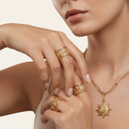 Seraphina Treasures Gaia gold and silver daisy rings with open band design. Botanical jewelry.