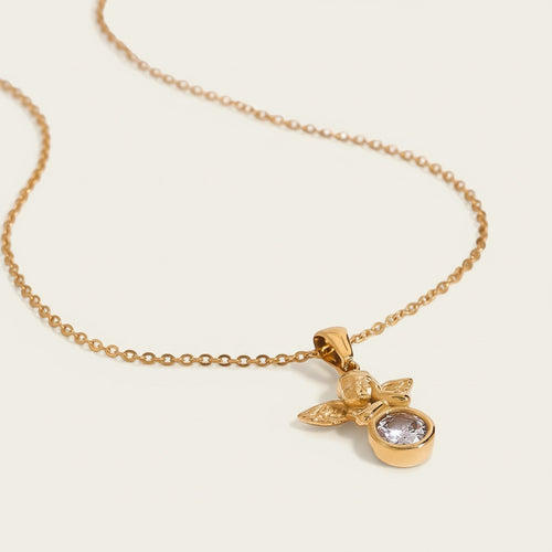 Seraphina Treasures gold angel necklace with clear rhinestone pendant. Delicate chain, elegant sparkle, symbolic protection and hope.