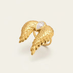 Seraphina Treasures gold adjustable ring with large textured angel wings and a pear-shaped clear crystal.