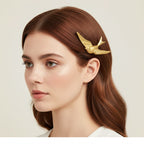 Seraphina Treasures gold metal flying bird hair clip, elegant design, 6.06cm length.