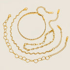 Seraphina Treasures Chrysara gold-tone bracelet set with heart, chain, and snake designs. Adjustable.