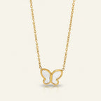 Seraphina Treasures gold necklace with a white mother-of-pearl butterfly pendant, symbolizing transformation.