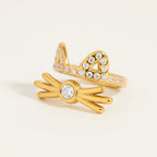 Seraphina Treasures gold cat ear ring with clear crystals and a central diamond accent. Adjustable open design.