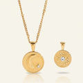 Seraphina Treasures gold celestial necklace with moon, star, and sun motifs. Features a delicate chain and two pendants.