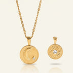 Seraphina Treasures gold celestial necklace with moon, star, and sun motifs. Features a delicate chain and two pendants.