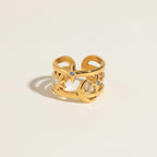 Seraphina Treasures gold open ring with sun, moon, stars and blue zircon stones. Adjustable band.