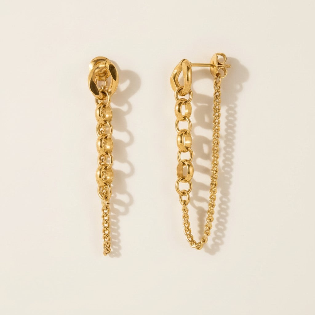 Seraphina Treasures gold chain drop earrings with interlocking rings and delicate tassels.