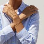 Seraphina Treasures Faustina gold chain hand bracelet with delicate bead accents.