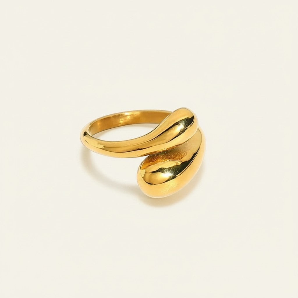 Seraphina Treasures gold-tone chunky adjustable open band ring with a modern, fluid design.