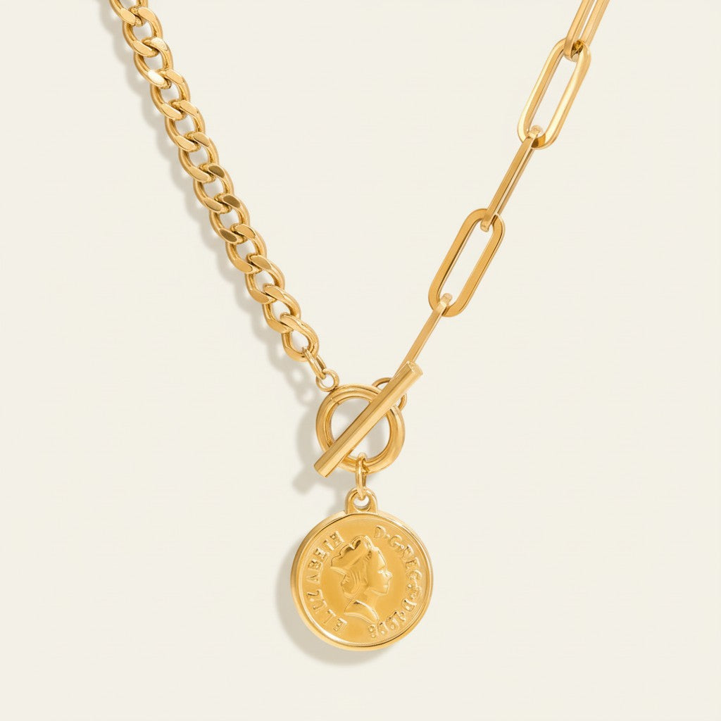Seraphina Treasures gold coin pendant necklace with toggle clasp and mixed chain links.