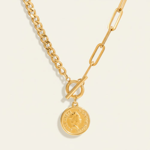 Seraphina Treasures gold coin pendant necklace with toggle clasp and mixed chain links.