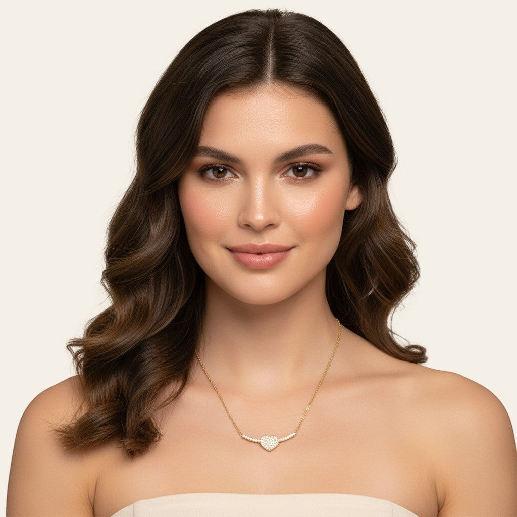 Seraphina Treasures gold-tone necklace with a pave crystal heart pendant and crystal accents on a delicate chain.