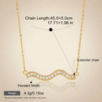 Seraphina Treasures gold wave necklace with clear crystals and extender chain. Waterproof and hypoallergenic.