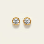 Seraphina Treasures gold stud earrings with clear round cubic zirconia, organic shape setting.