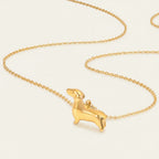 Seraphina Treasures gold dachshund necklace, a charming accessory for dog lovers.