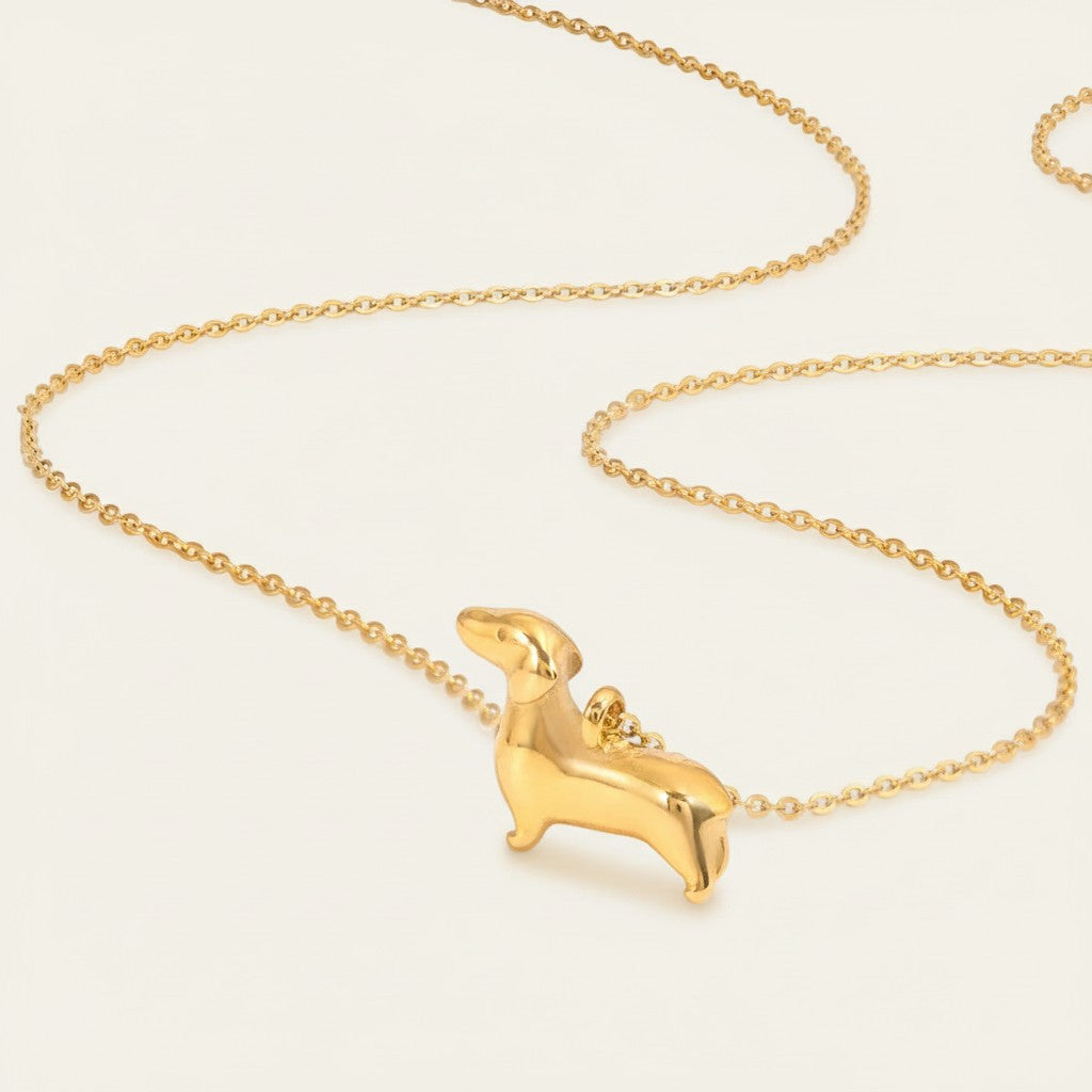 Seraphina Treasures gold dachshund necklace, a charming accessory for dog lovers.