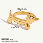 Seraphina Treasures gold dachshund ring with zirconia eye detail. Adjustable, hypoallergenic, and waterproof.