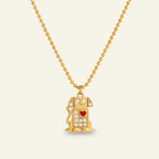 Seraphina Treasures gold dog necklace with crystal accents and a red heart detail.