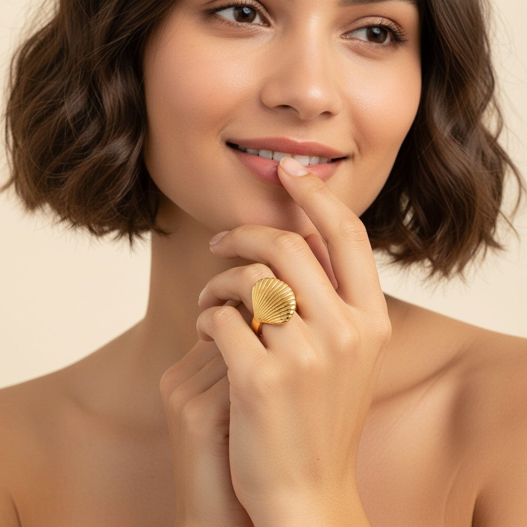 Seraphina Treasures gold-tone adjustable ring with double scallop shell design. Elegant and sophisticated.