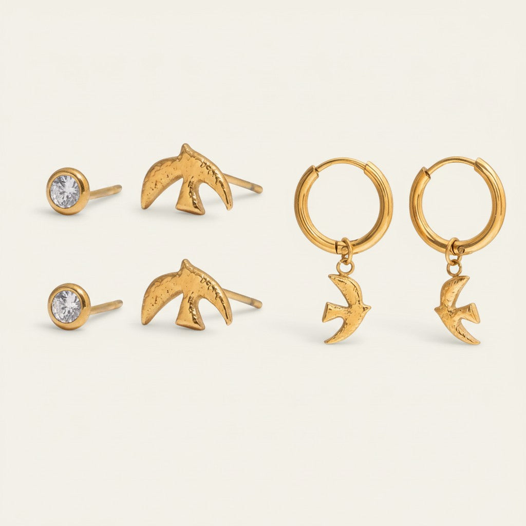 Seraphina Treasures gold-tone 3-pair earring set with peace dove and zircon stud designs.