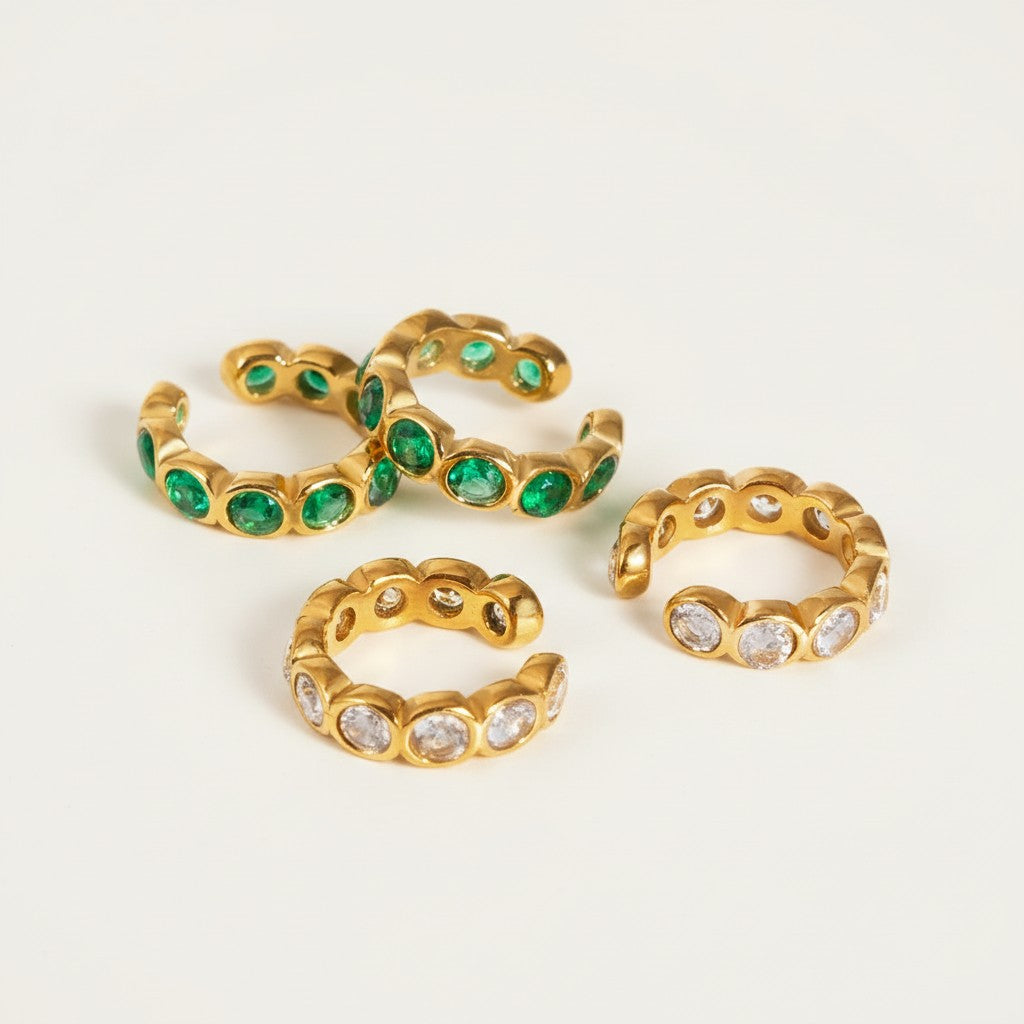 Seraphina Treasures gold ear clips with green or white zircon stones. Elegant, comfortable, and secure fit.