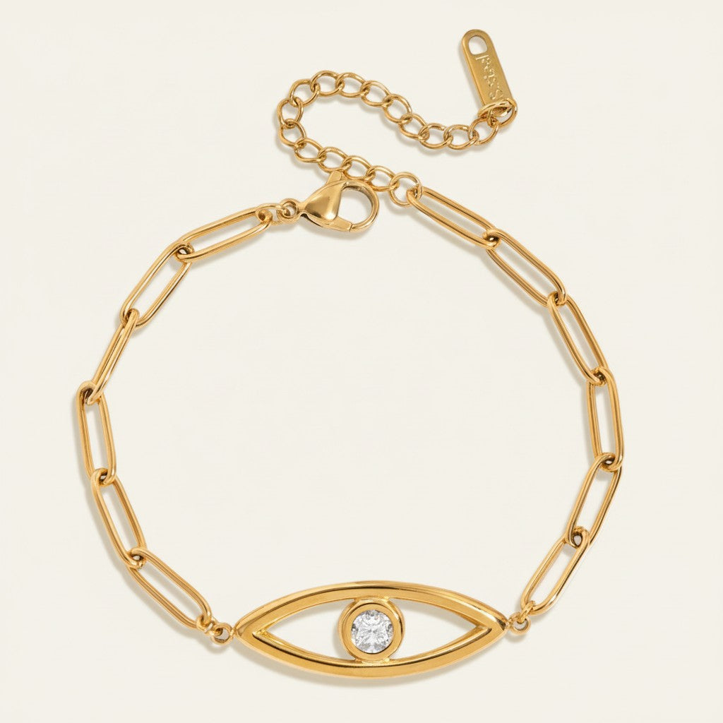 Seraphina Treasures gold-tone bracelet with paperclip chain and evil eye charm featuring a clear zircon.