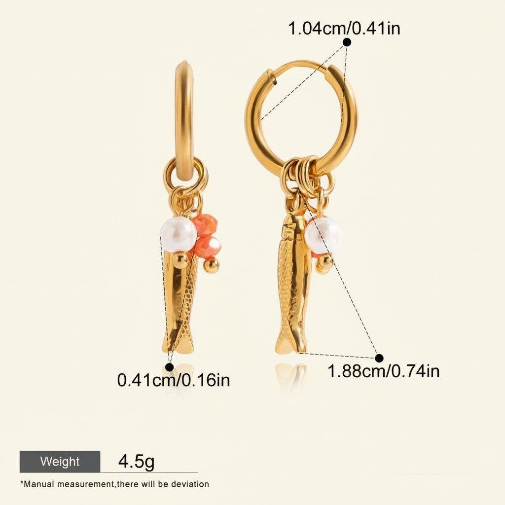 Seraphina Treasures gold fish hoop earrings with pearls and orange beads. Lightweight and hypoallergenic.
