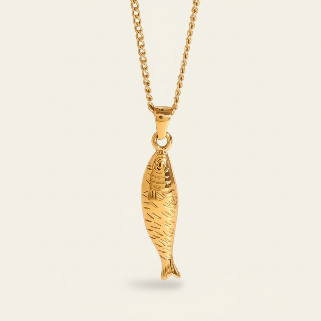 Seraphina Treasures gold fish pendant necklace with intricate scale details and a delicate chain.
