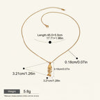 Seraphina Treasures Morwenna gold-tone fish skeleton pendant necklace, 45.0+5.0cm length.