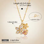 Seraphina Treasures gold-tone necklace with a floral and ladybug charm adorned with clear and pink cubic zirconia stones.