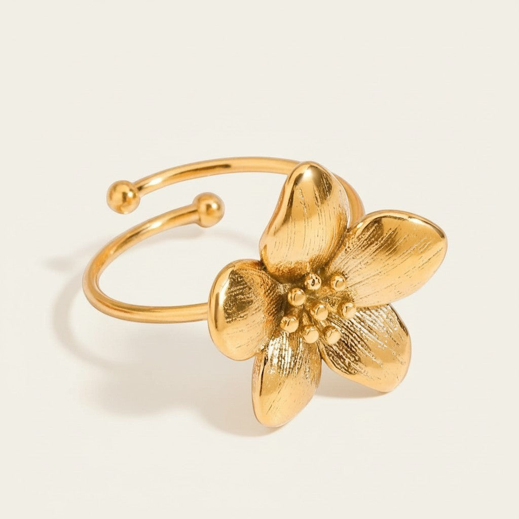 Seraphina Treasures gold open band ring with a detailed floral motif, perfect for adding natural charm.