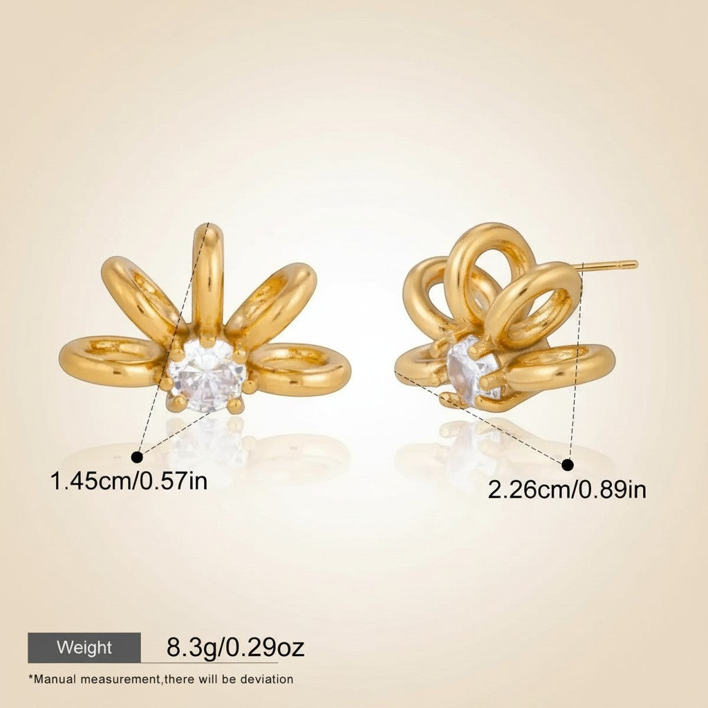 Seraphina Treasures gold flower stud earrings with clear cubic zirconia center. Hypoallergenic and waterproof.