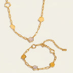 Seraphina Treasures gold-tone jewelry set with flower-shaped charms and mother-of-pearl inlays.