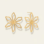 Seraphina Treasures gold hollow flower stud earrings with textured center. Delicate floral design.
