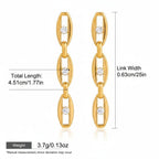 Seraphina Treasures gold-tone drop earrings with clear gemstones and oval links.