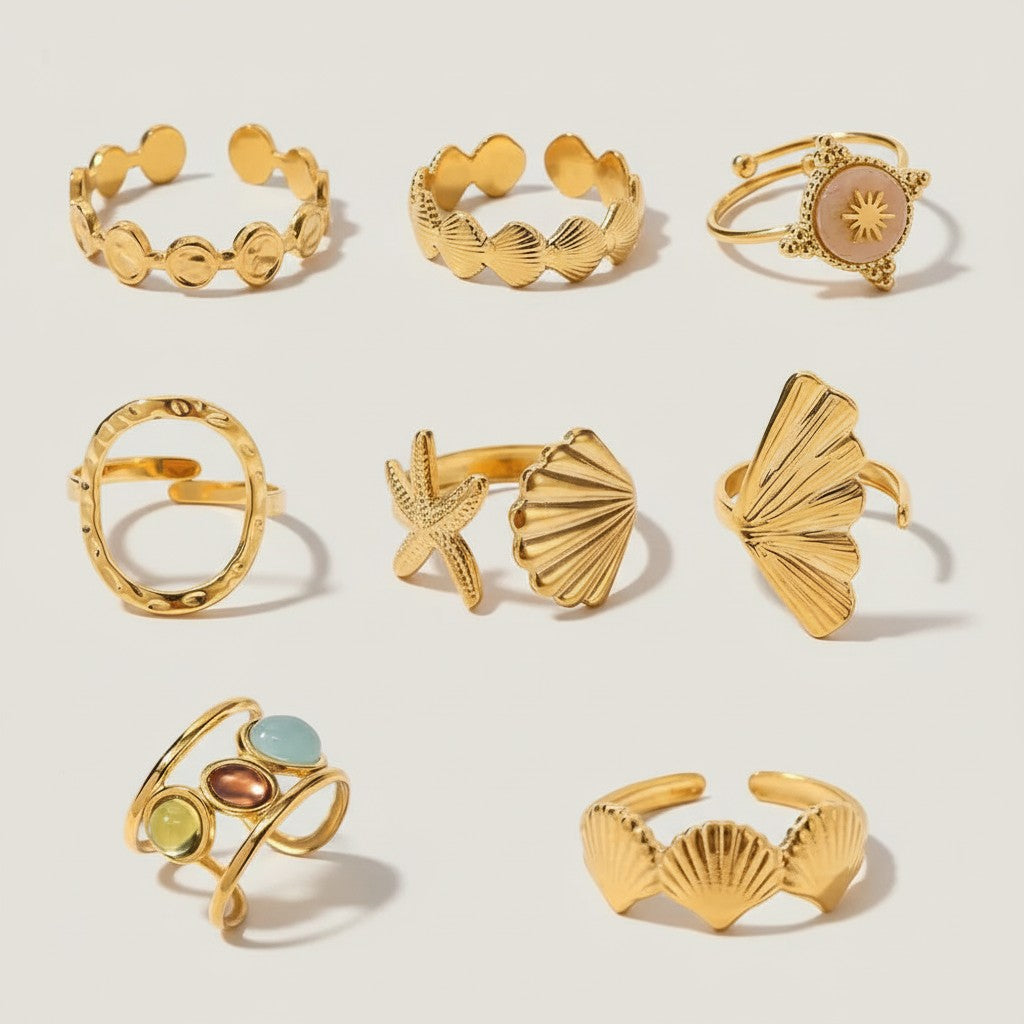 Seraphina Treasures gold-tone adjustable rings with geometric, shell, and starfish designs.