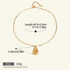 Seraphina Treasures gold-tone necklace with a unique hat-shaped pendant. Waterproof and hypoallergenic.