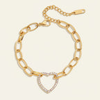 Seraphina Treasures gold-tone link bracelet with crystal-encrusted heart pendant.